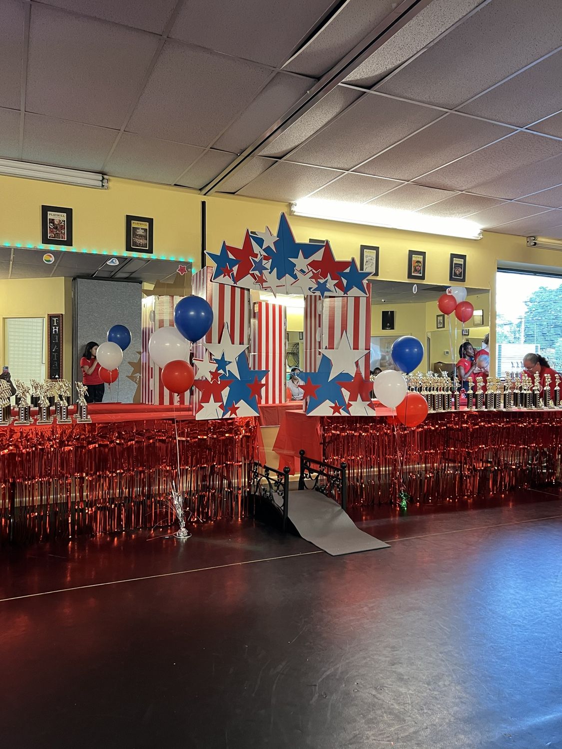 The red, white and blue star arch and bridge set up for the Rise Graduation