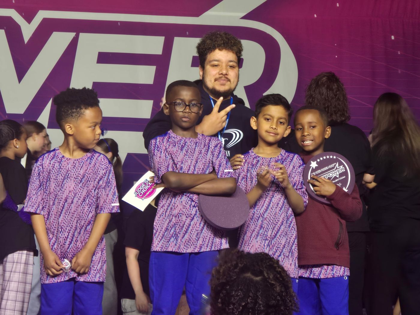 Rhythm Crew boys on stage with their Judge's Choice award