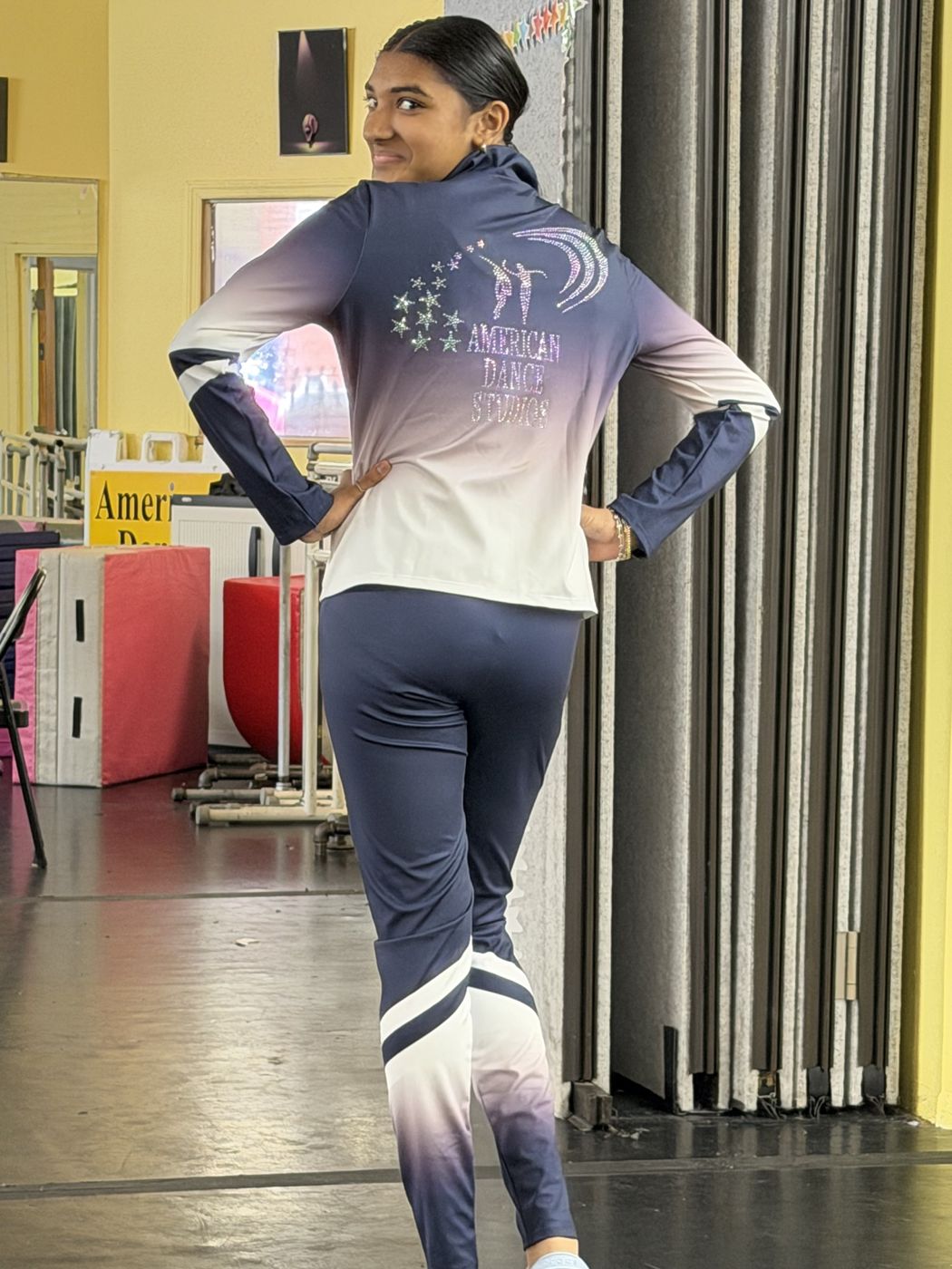 Back of the team warm-up jacket with the rhinestone ADS logo